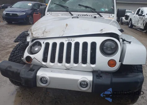 2012 Jeep Wrangler Unlimited Sahara из США, поврежденный, VIN 1C4BJWEG3CL254464